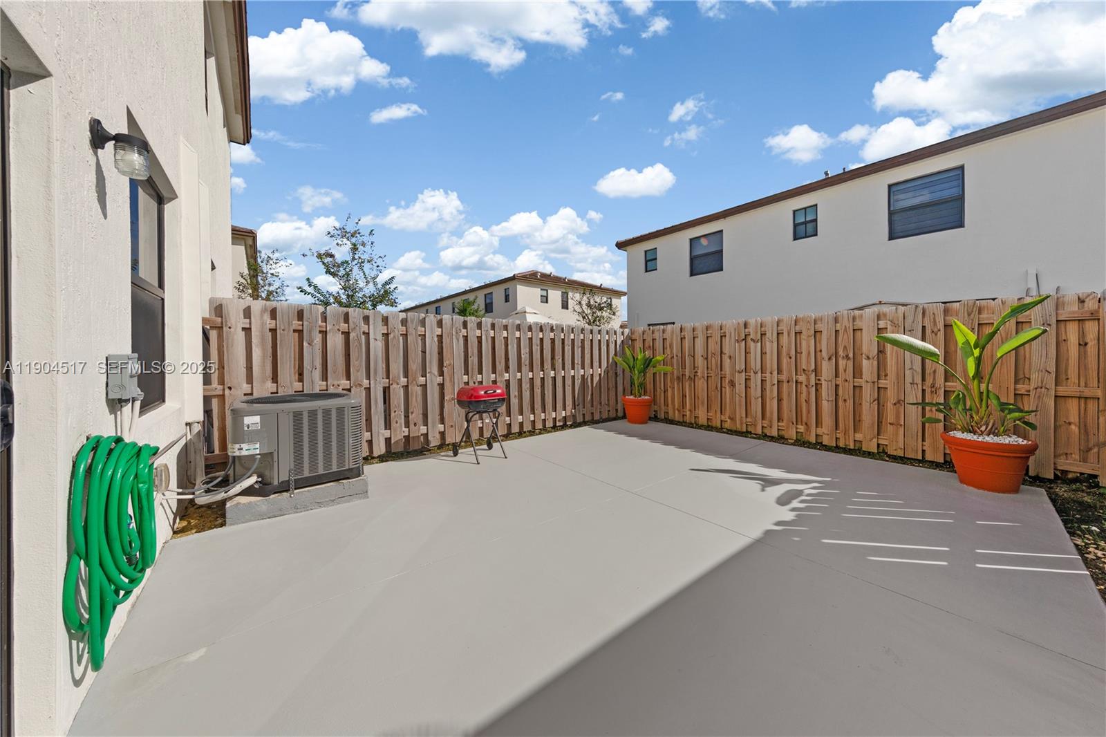 12942 Southwest 232nd Terrace Homestead, FL 33032 - Photo 20 of 27 a view of a porch with a garden
