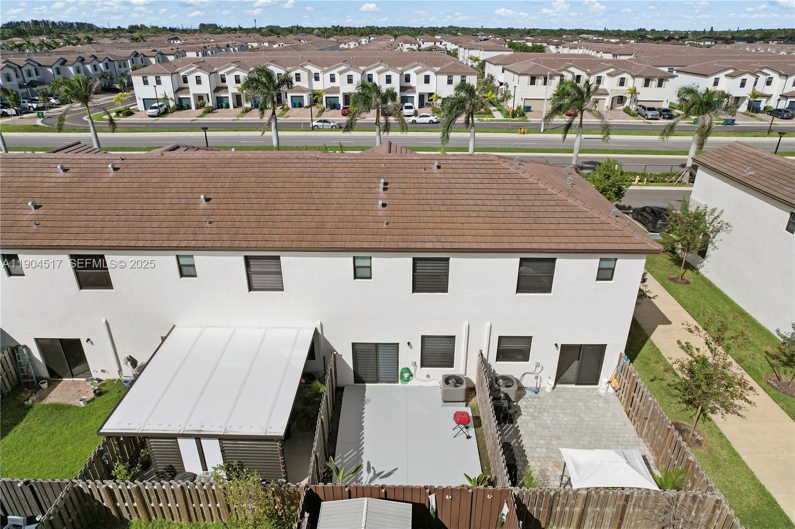 12942 Southwest 232nd Terrace Homestead, FL 33032 - Photo 27 of 27 an aerial view of a house with a yard