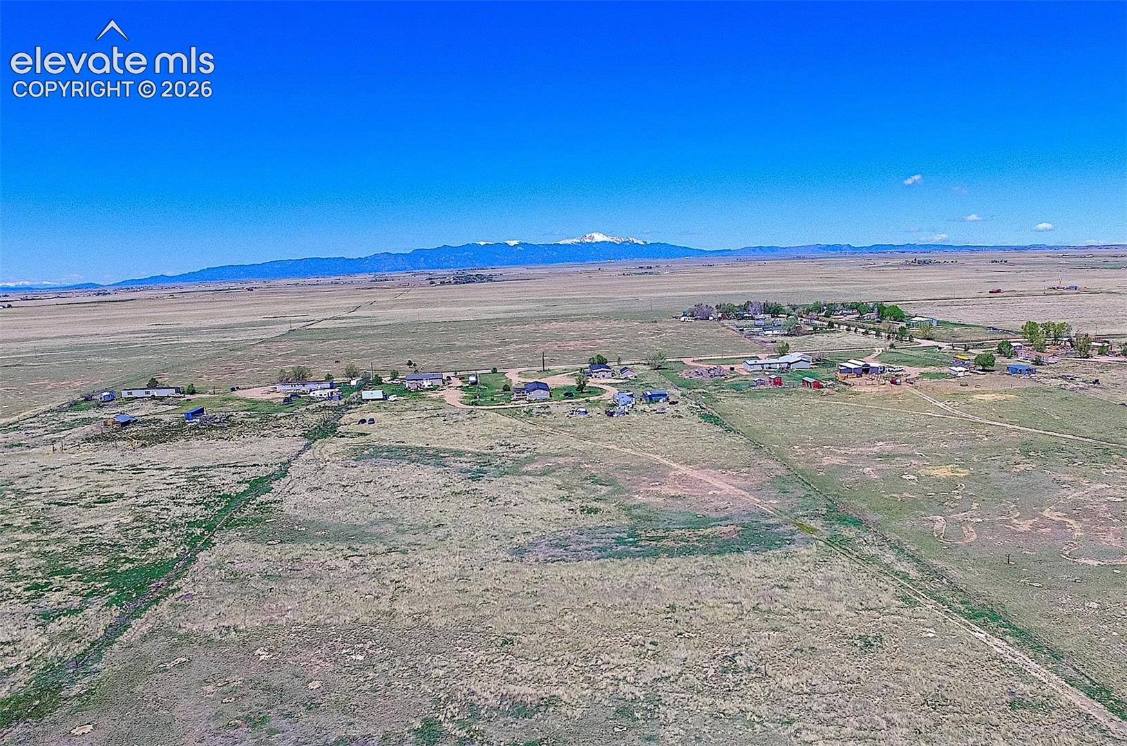 3425 Wiesner Road Calhan, CO 80808 - Photo 2 of 25 Overview of rural landscape with mountains