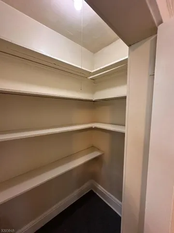 a storage room with washer and dryer