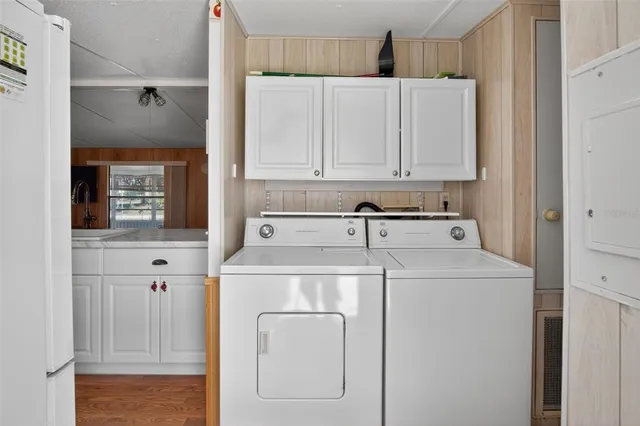 a utility room with dryer and washer