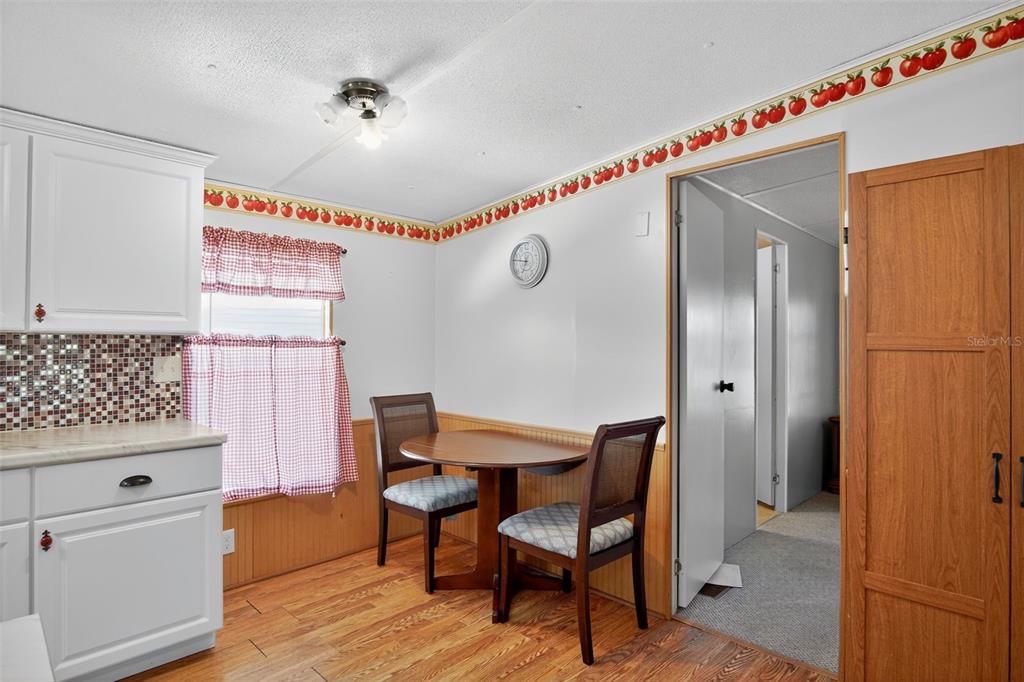 17536 Brinkerhoff Lane Okeechobee, FL 34974 - Photo 10 of 17 a kitchen with a table and chairs