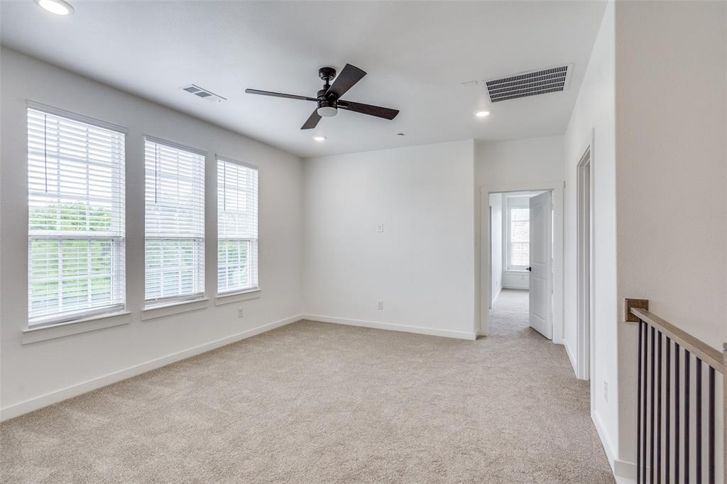 7207 Switchgrass Road Frisco, TX 75033 - Photo 18 of 26 a view of an empty room with a window