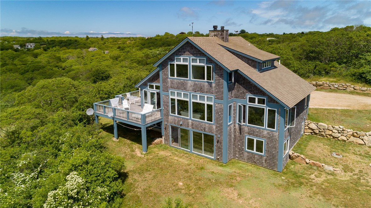 1312 Cooneymus Road Block Island, RI 02807 - Photo 1 of 24 West side with deck for views of BI Sound and sunsets