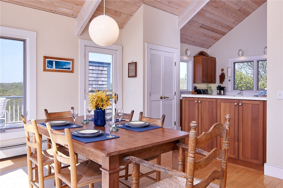 1312 Cooneymus Road Block Island, RI 02807 - Photo 11 of 24 Dining room and kitchen