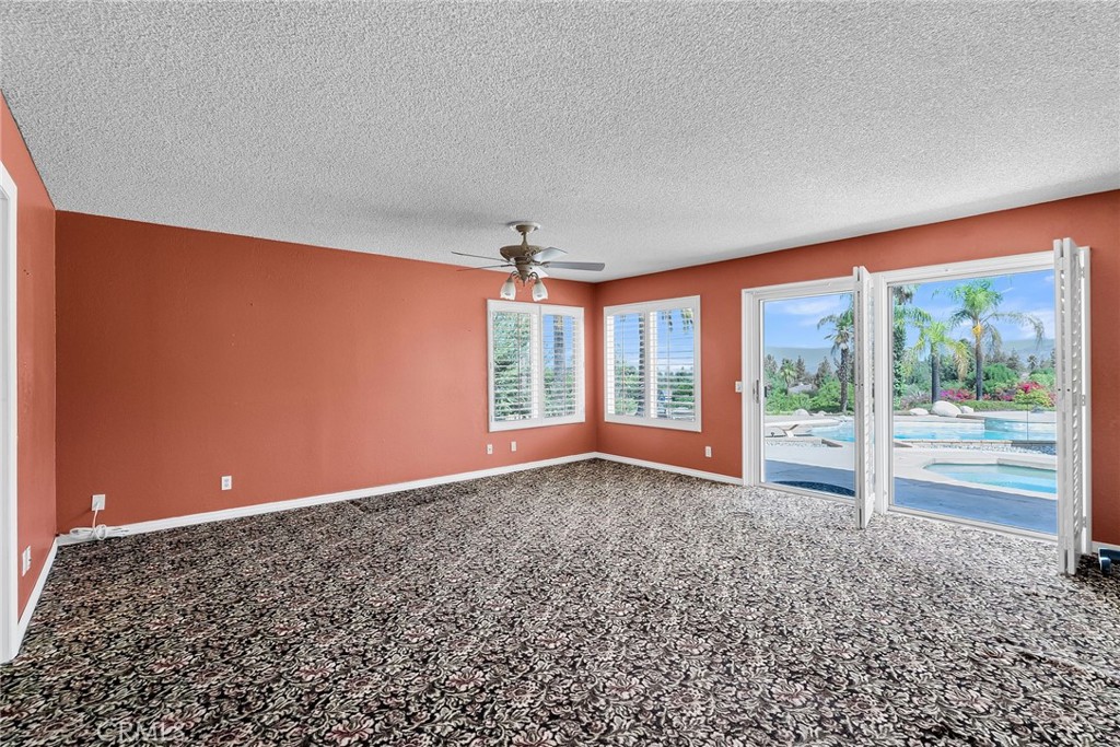 1249 Coronet Drive Riverside, CA 92506 - Photo 20 of 57 a view of an empty room with a window