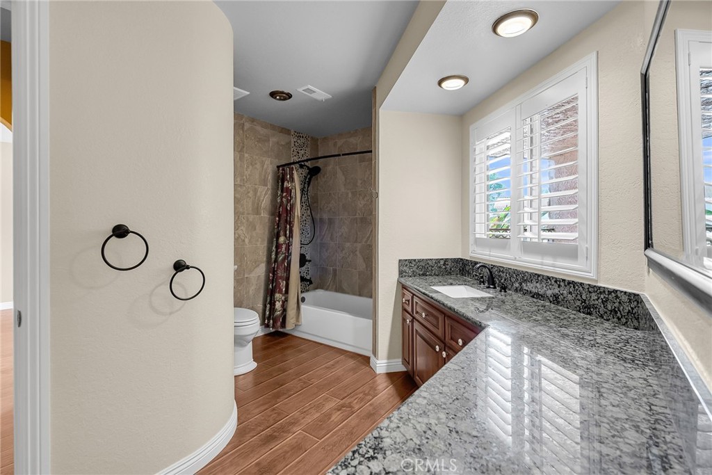 1249 Coronet Drive Riverside, CA 92506 - Photo 29 of 57 a view of an empty room and window