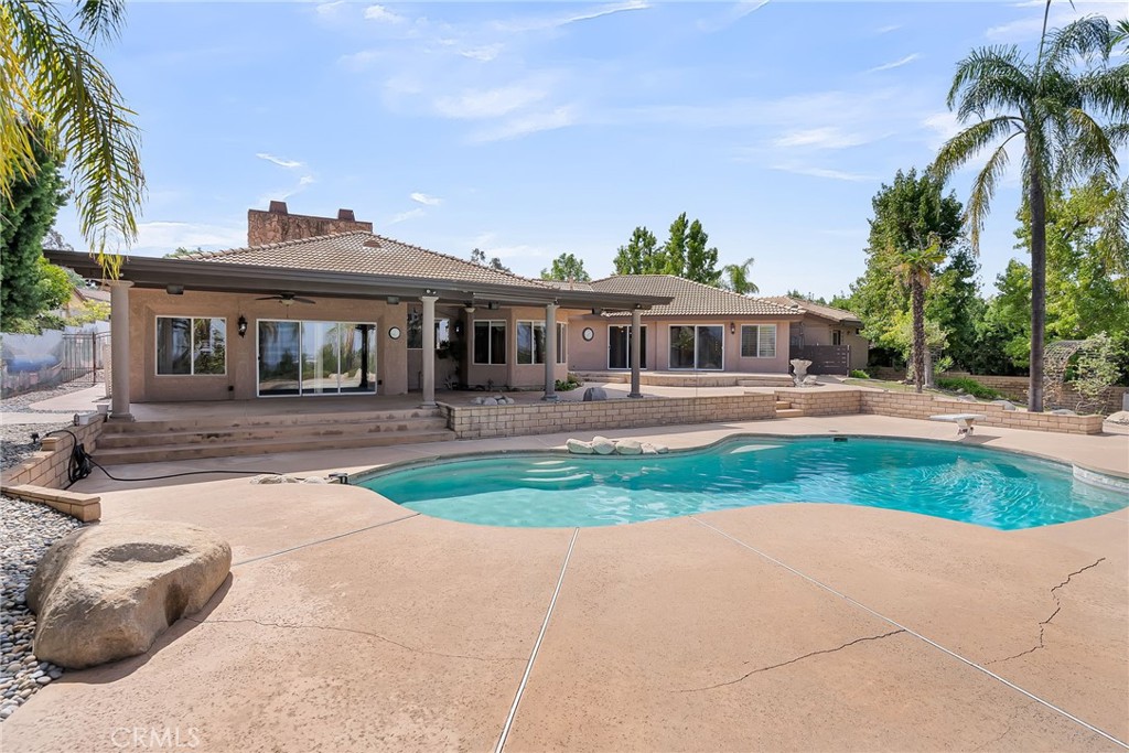 1249 Coronet Drive Riverside, CA 92506 - Photo 39 of 57 front view of a house with a yard