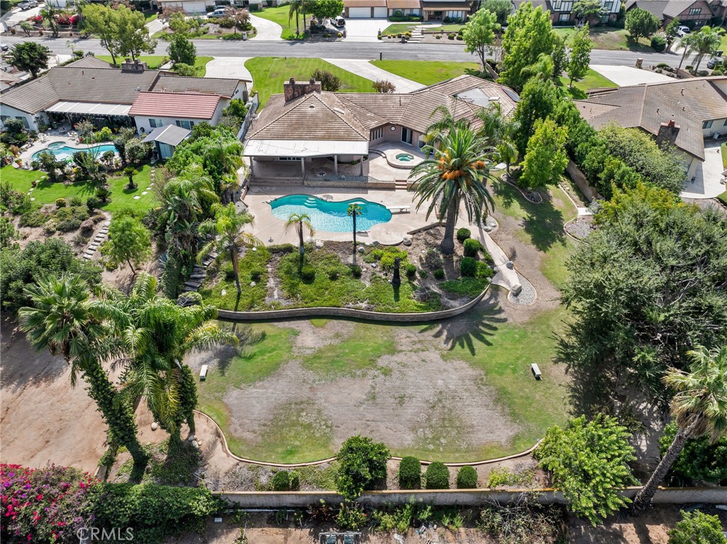 1249 Coronet Drive Riverside, CA 92506 - Photo 48 of 57 an aerial view of a residential houses with outdoor space and a lake view