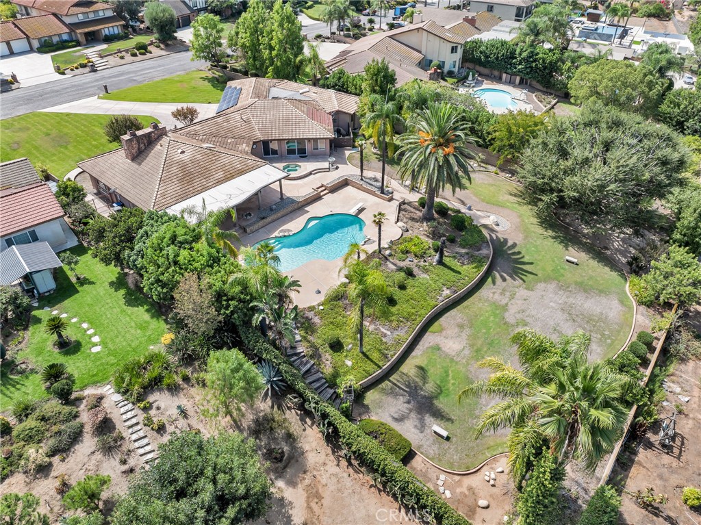 1249 Coronet Drive Riverside, CA 92506 - Photo 49 of 57 an aerial view of a house with a yard