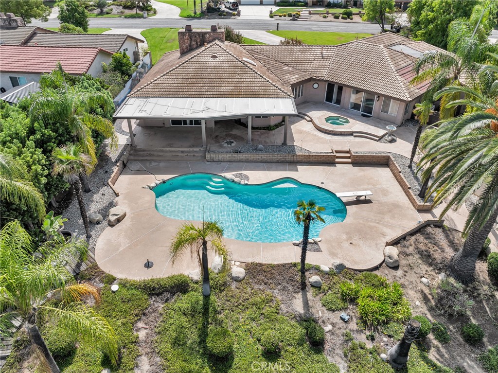 1249 Coronet Drive Riverside, CA 92506 - Photo 51 of 57 an aerial view of a house with swimming pool and patio