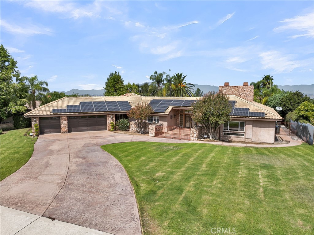 1249 Coronet Drive Riverside, CA 92506 - Photo 56 of 57 a front view of house with yard and outdoor seating