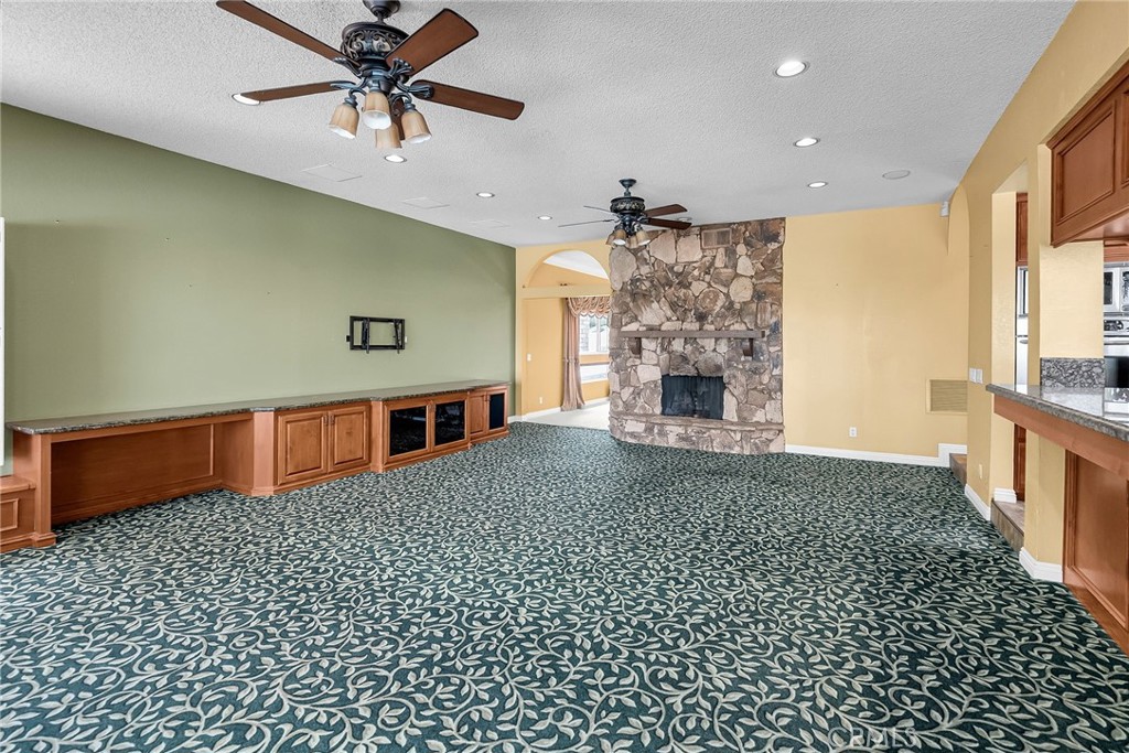 1249 Coronet Drive Riverside, CA 92506 - Photo 6 of 57 a living room with a couch