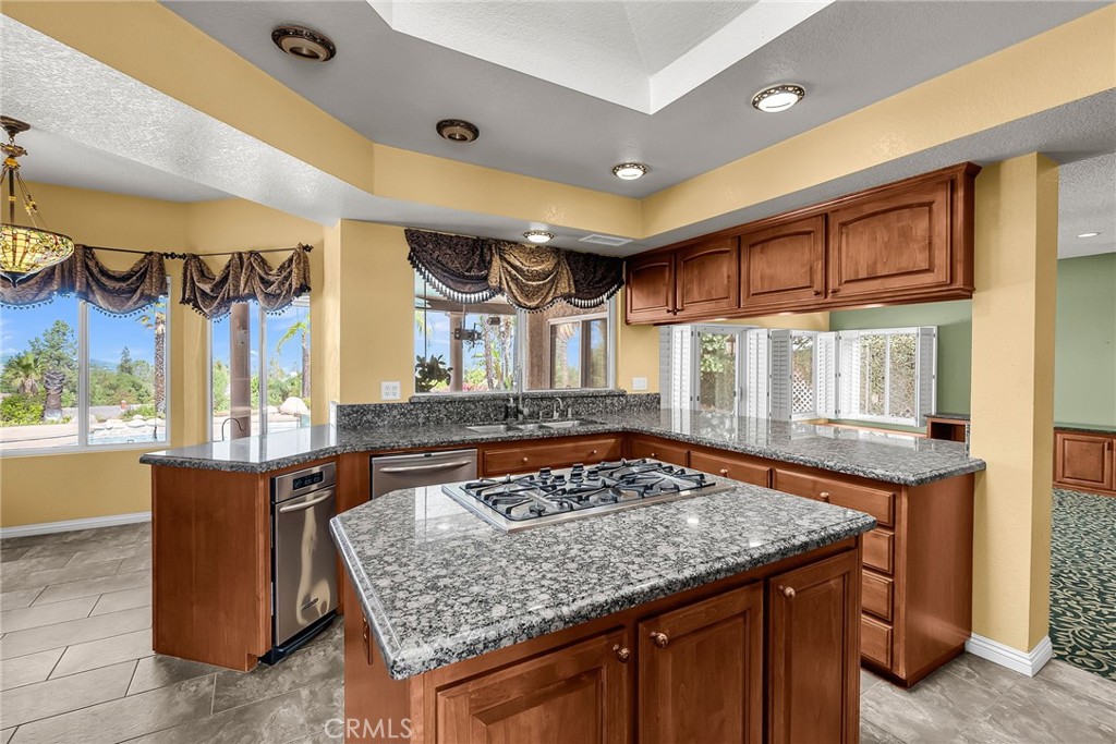 1249 Coronet Drive Riverside, CA 92506 - Photo 9 of 57 a view of a kitchen area of a house