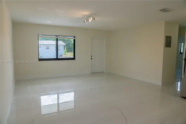 an empty room with windows
