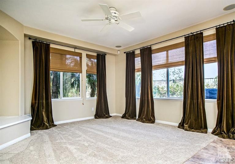 14303 Peach Hill Road Moorpark, CA 93021 - Photo 17 of 41 a view of a room with window and a ceiling fan