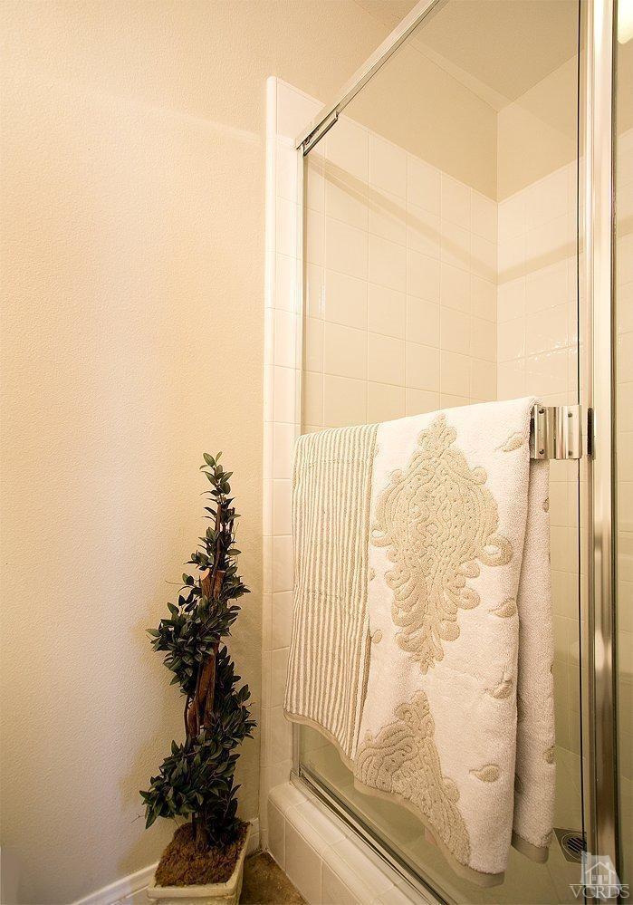 14303 Peach Hill Road Moorpark, CA 93021 - Photo 21 of 41 a bathroom with a shower