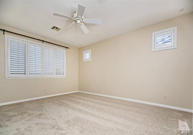 14303 Peach Hill Road Moorpark, CA 93021 - Photo 25 of 41 a view of an empty room with a window