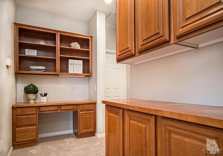 14303 Peach Hill Road Moorpark, CA 93021 - Photo 28 of 41 a kitchen with a cabinets and window