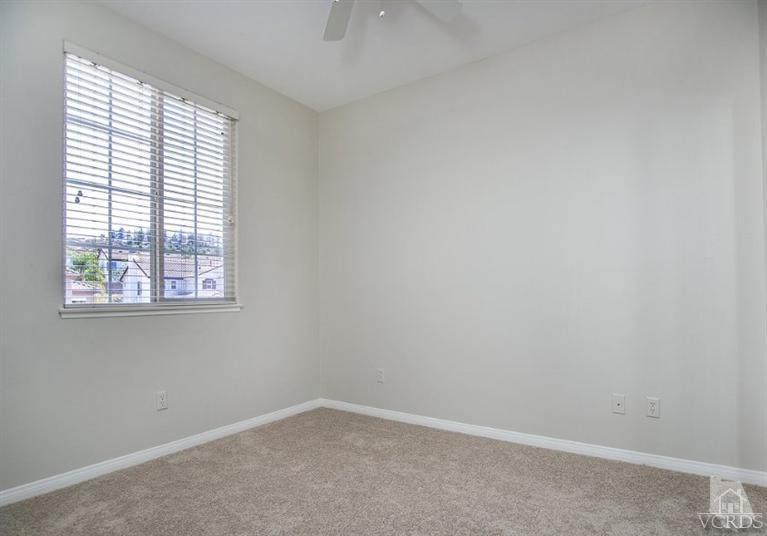 14303 Peach Hill Road Moorpark, CA 93021 - Photo 30 of 41 an empty room with a window