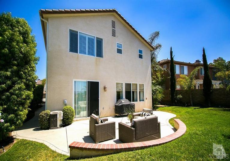 14303 Peach Hill Road Moorpark, CA 93021 - Photo 38 of 41 a front view of house with yard and outdoor seating