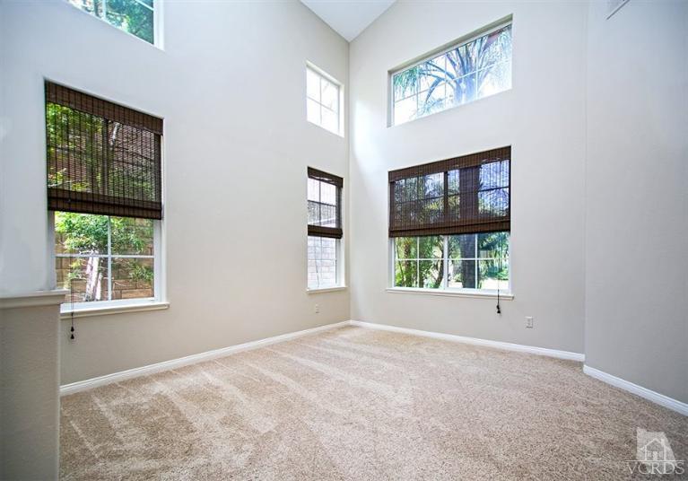 14303 Peach Hill Road Moorpark, CA 93021 - Photo 8 of 41 a view of an empty room with a window