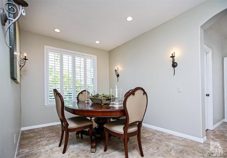 14303 Peach Hill Road Moorpark, CA 93021 - Photo 9 of 41 a view of a dining room with furniture and window