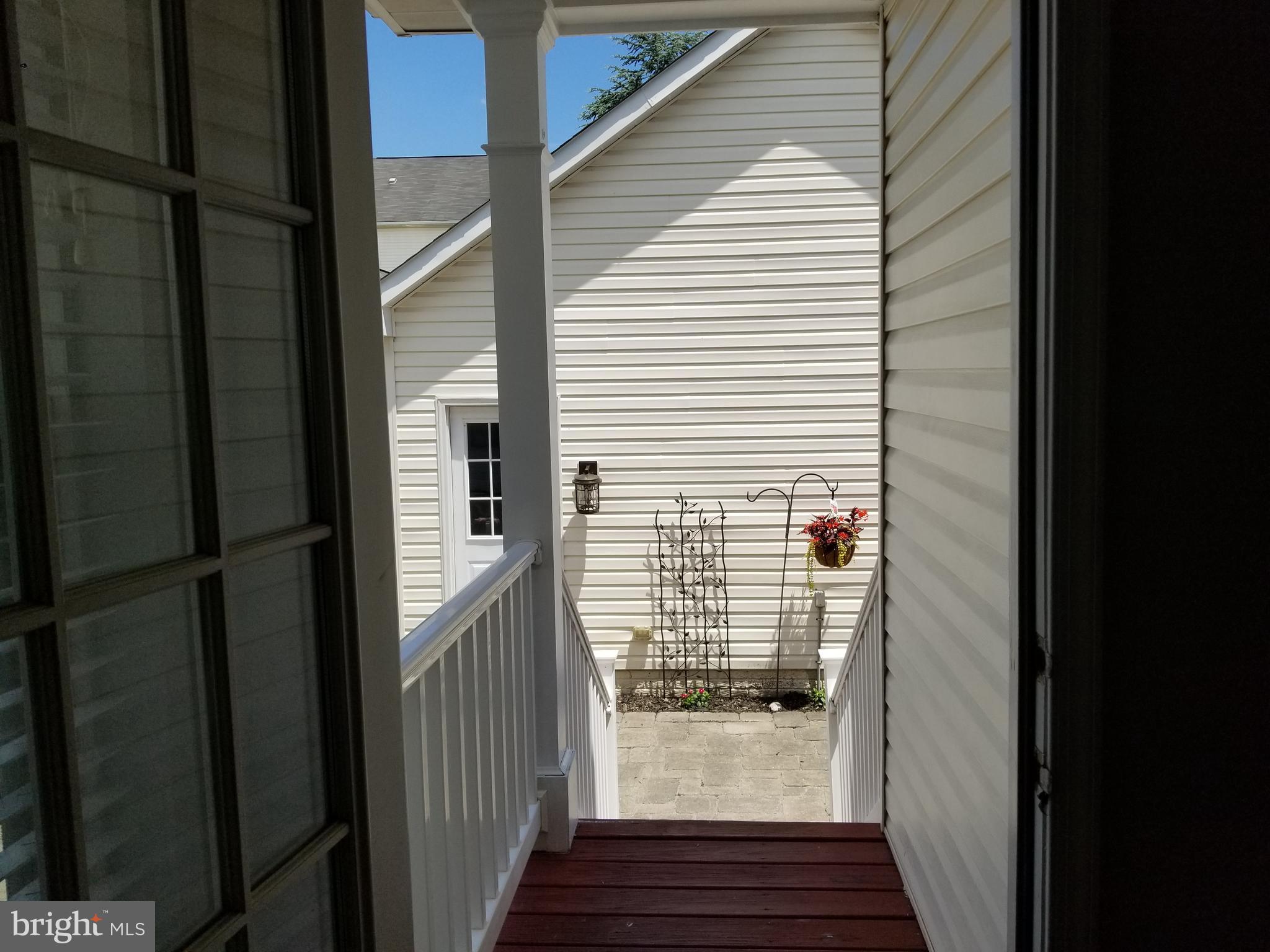18421 Cornflower Road Boyds, MD 20841 - Photo 3 of 48 Stairs going doing to backyard