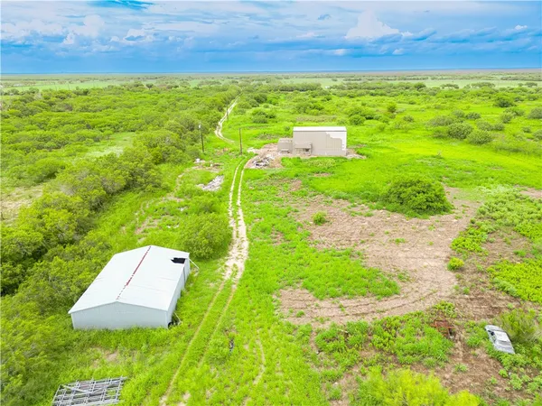 a view of a yard with an outdoor space