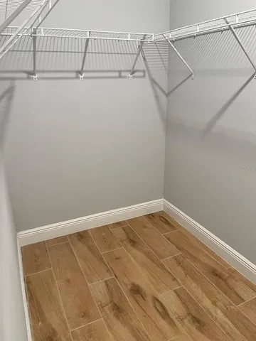 a view of a room with racks on the wall