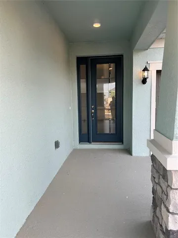 an empty room with fireplace