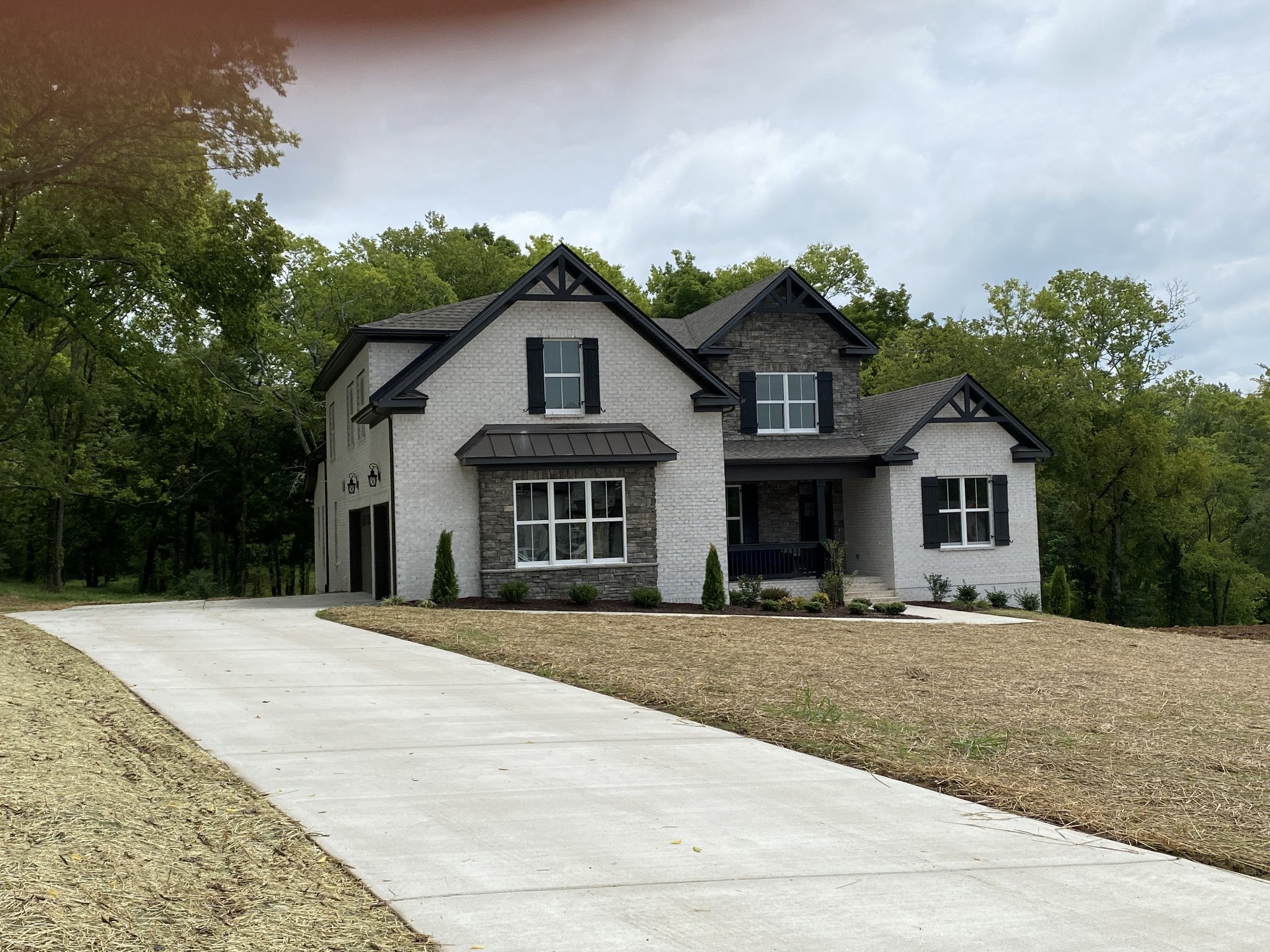 1074 Hideaway Road Columbia, TN 38401 - Photo 2 of 10 a front view of a house with a yard