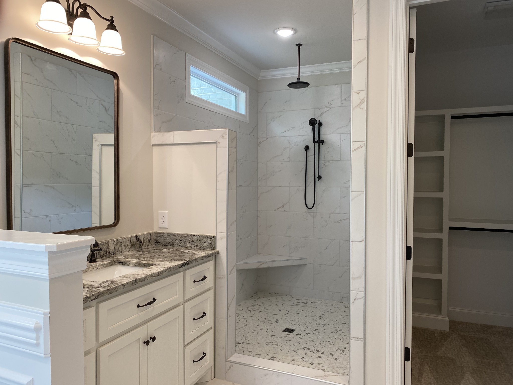 1074 Hideaway Road Columbia, TN 38401 - Photo 8 of 10 a bathroom with a granite countertop sink two mirror and shower