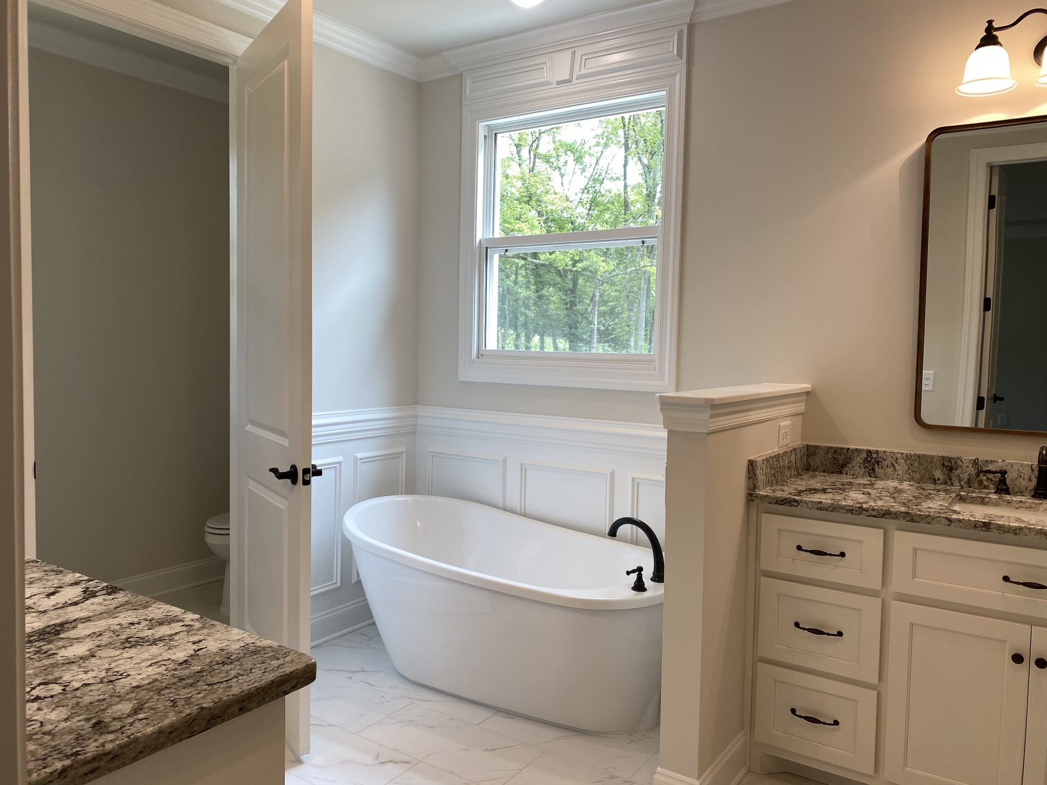 1074 Hideaway Road Columbia, TN 38401 - Photo 9 of 10 a bathroom with a granite countertop tub sink and mirror