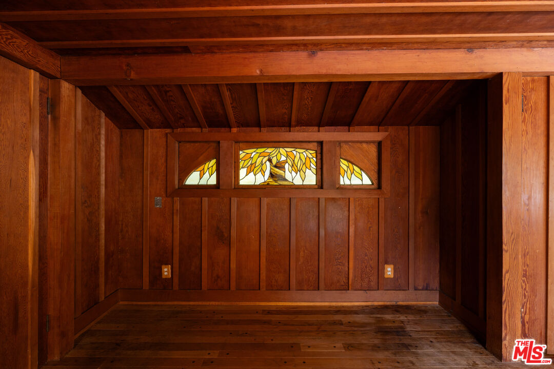 1748 Laurel Canyon Boulevard Los Angeles, CA 90046 - Photo 17 of 24 a view of a door and wooden floor