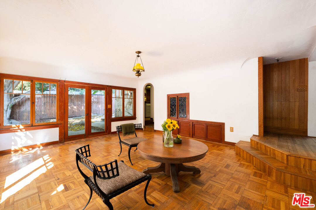 1748 Laurel Canyon Boulevard Los Angeles, CA 90046 - Photo 3 of 24 a living room with furniture and a window