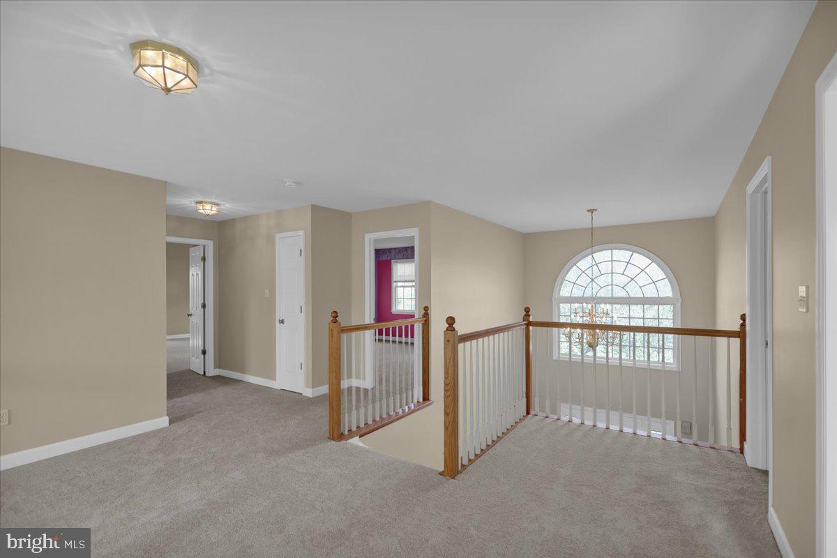 10 Virginia Avenue Sinking Spring, PA 19608 - Photo 16 of 35 an empty room with windows chandelier