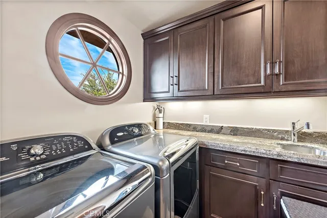 a kitchen with a stove and a sink