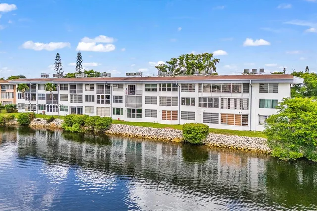 a house with river in front of it