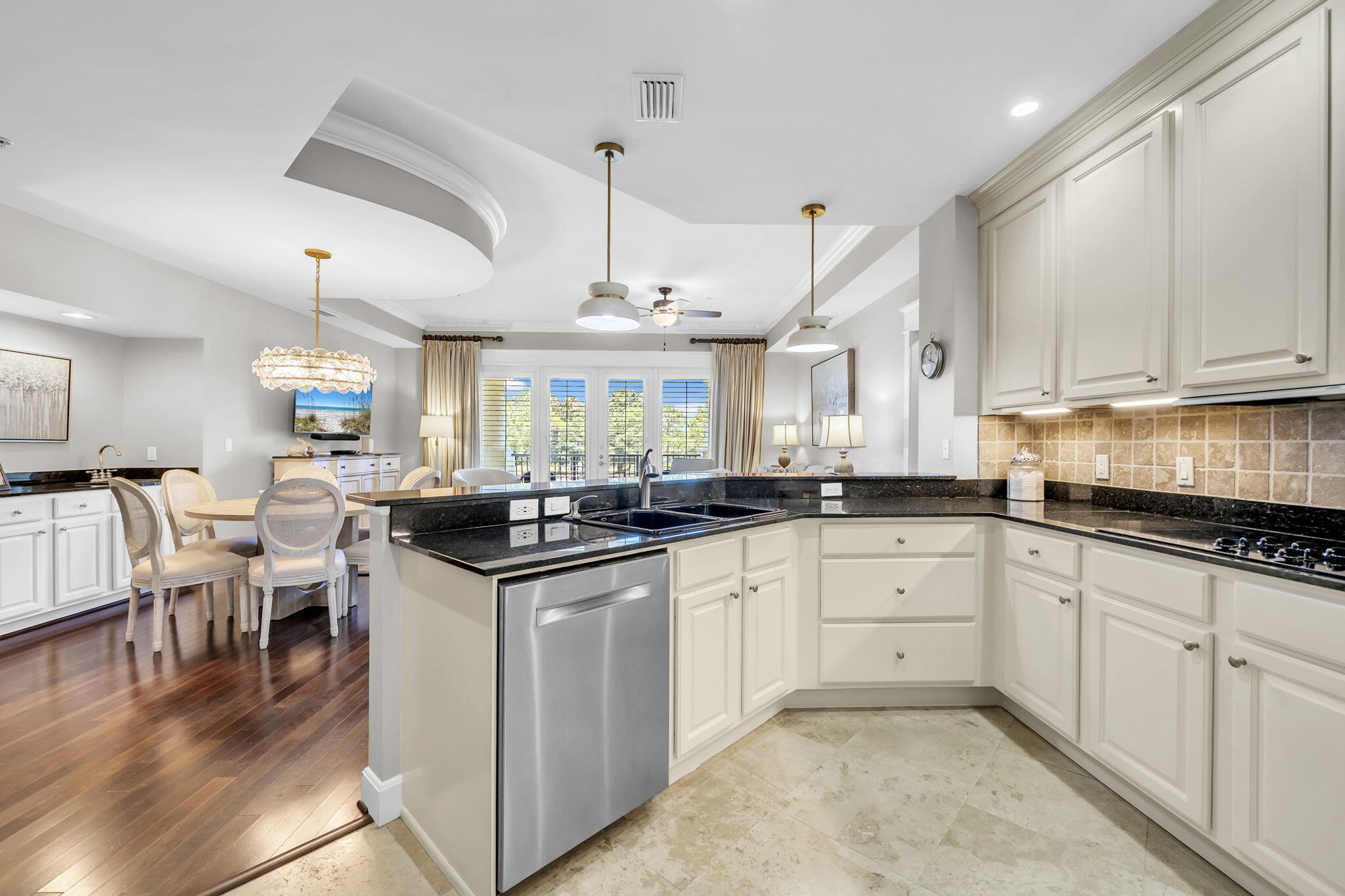 5360 Pine Ridge Lane, Unit 5360 Miramar Beach, FL 32550 - Photo 15 of 44 a kitchen with stainless steel appliances granite countertop a stove and cabinets