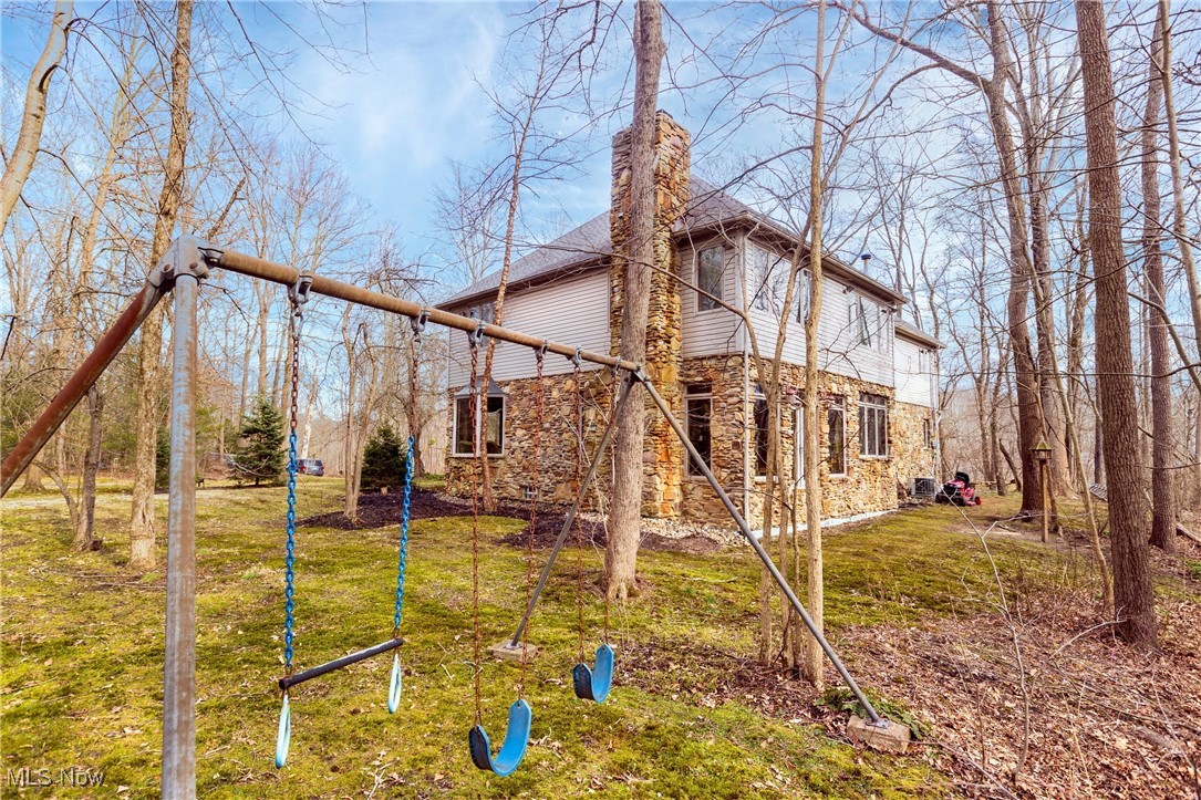 10000 Wisner Road Willoughby, OH 44094 - Photo 31 of 32 Rear view of house with a yard