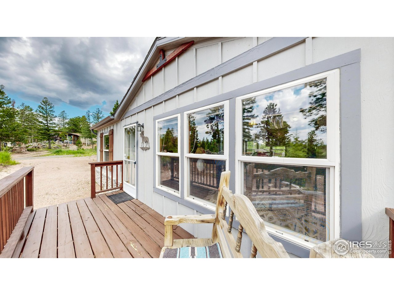 62 Spokane Court Red Feather Lakes, CO 80545 - Photo 21 of 38 a black and white photo of a house
