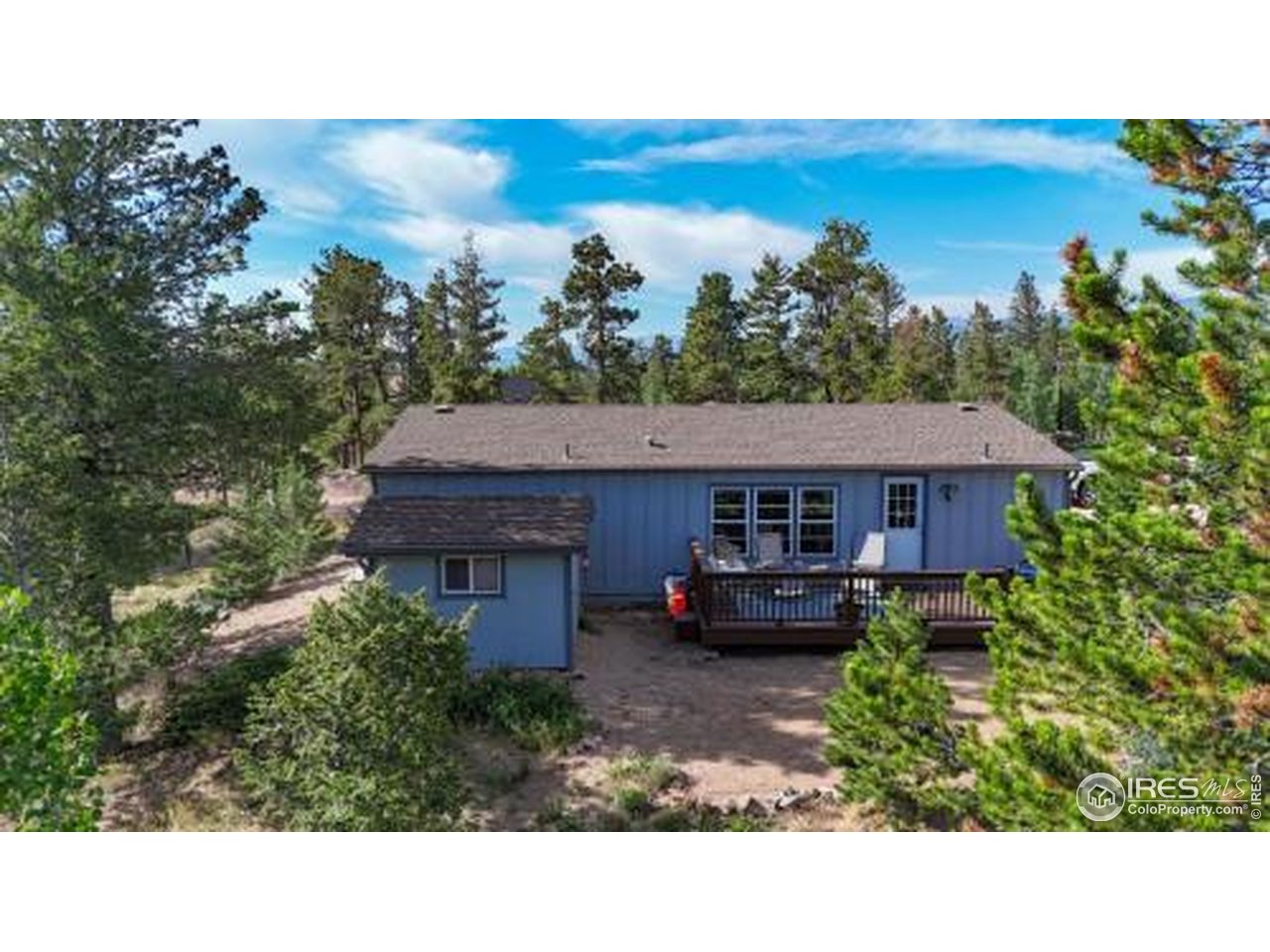 62 Spokane Court Red Feather Lakes, CO 80545 - Photo 29 of 38 a house view with a garden space