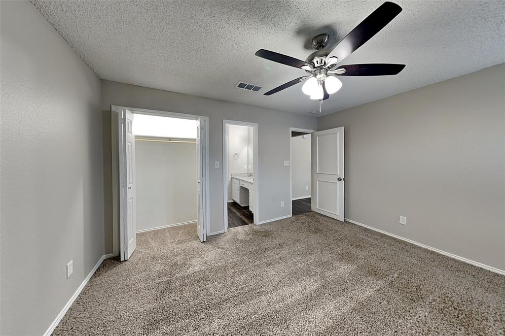 7836 Prairie Drive Watauga, TX 76148 - Photo 8 of 20 a view of an empty room and chandelier fan