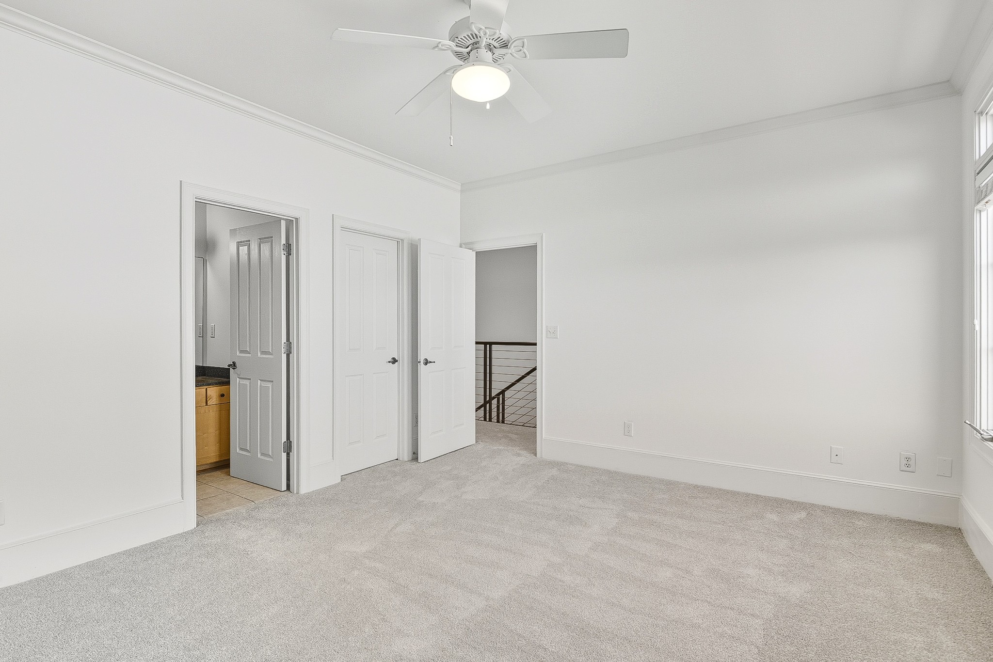 555 South Front Street Memphis, TN 38103 - Photo 17 of 31 a view of an empty room with a ceiling fan