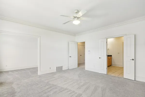 a view of a livingroom with a ceiling fan