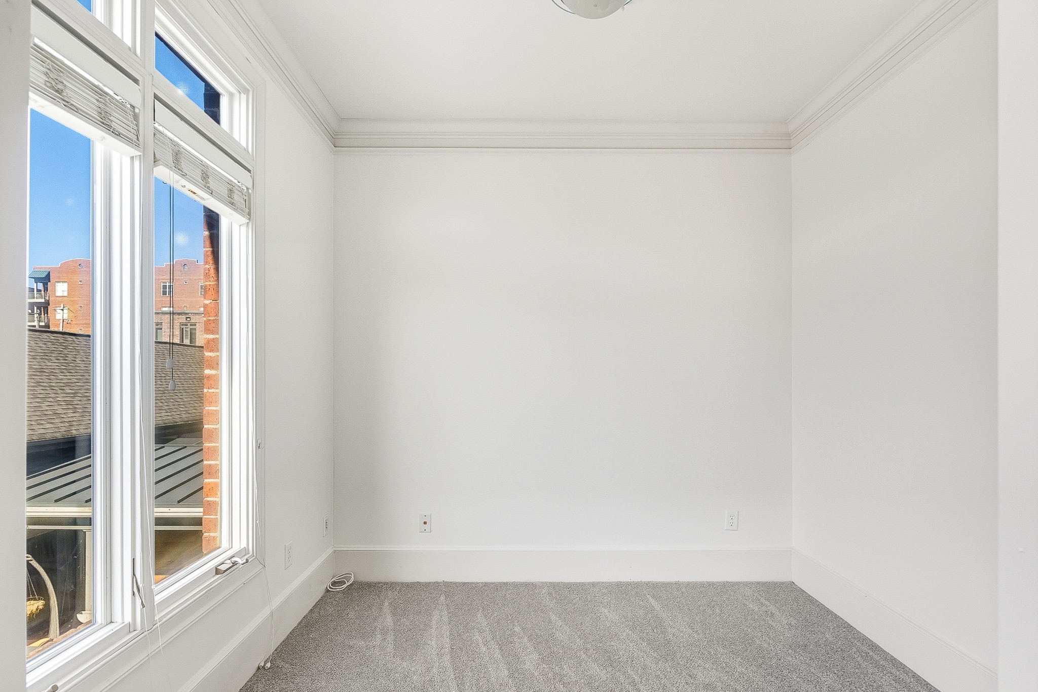 555 South Front Street Memphis, TN 38103 - Photo 24 of 31 a view of a small space with wooden floor and a window