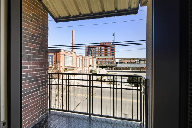 a view of a balcony and a window