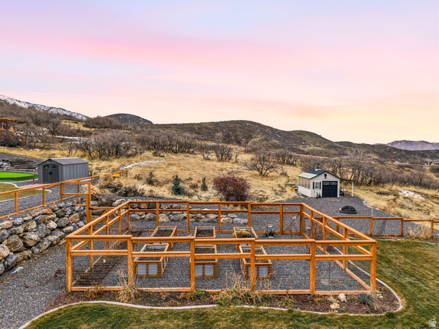102 Elk Ridge Drive Elk Ridge, UT 84651 - Photo 48 of 61 Another great shot of the garden area! Also- notice the retaining walls on either side of the property all the way down the property line.