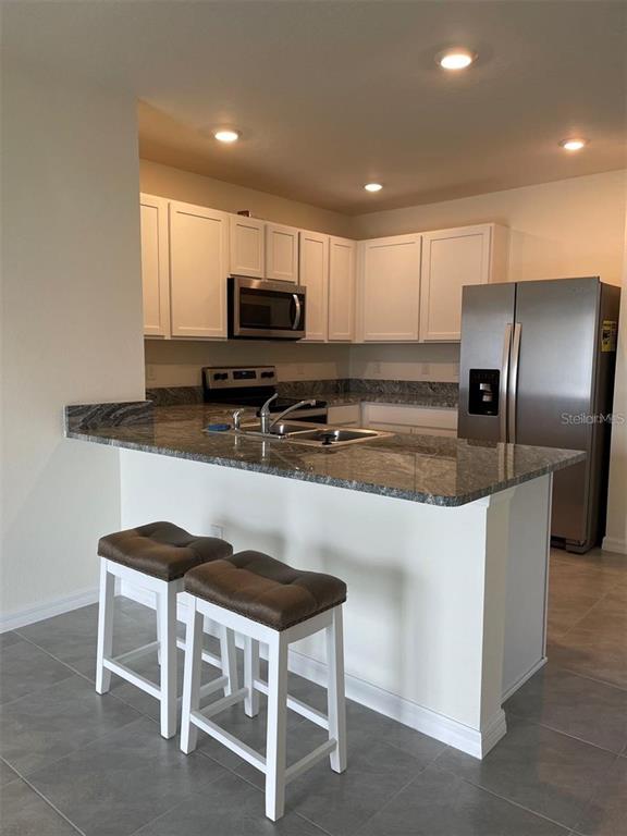 5526 Oxford Gray Road Wesley Chapel, FL 33545 - Photo 4 of 12